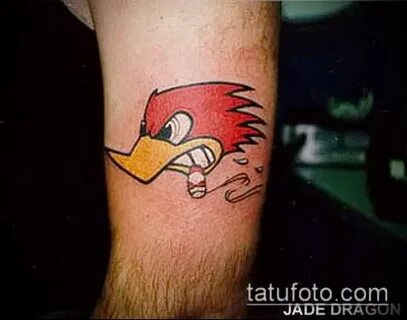 woodpecker tattoo photo (meaning) - an example of an interes