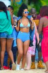 Rihanna in a Bikini at a beach in Barbados - December 2013 *