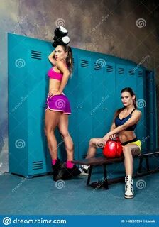 Photo about Beautiful young women in the locker room. 