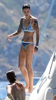 Ruby Rose shows off her tattooed bikini body in blue two-pie