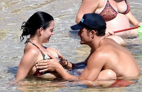 Orlando Bloom Grabs Katy Perry’s Boobs During Beach Vacation.