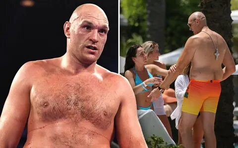 Photos) Married Tyson Fury spotted being oiled up by girls i