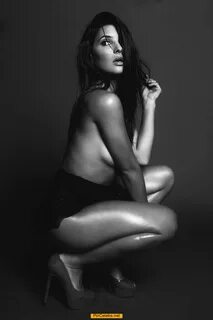 Camila Banus braless black-&-white image