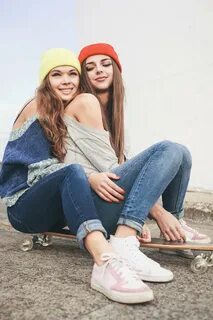 Two Young Longboarding Girl Friends Stock Photo - Image of c