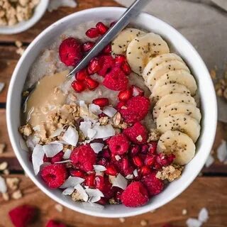 Oatmeal bowl 🎉 almond-coconut oatmeal with banana, raspberri