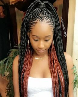 woman with black and red hair, in a ponytail, ghana braids s