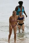 Taylor Schilling shows off toned figure on the beach during 