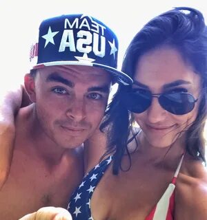 4. Rickie Fowler with pole vaulter wife Allison StokkeCredit. 