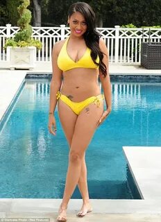 LaLa Anthony sits poolside for swimwear shoot Bazaar Daily U