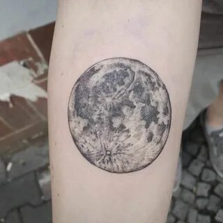 Realistic full moon tattoo on the right forearm by Jak Tatto