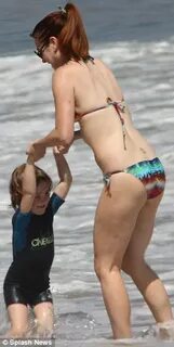 Make-up free Alyson Hannigan, 39, bares super slim bikini bo