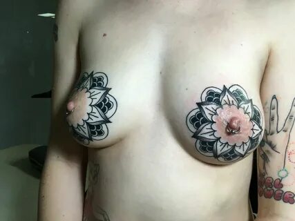 Slideshow tatto between boobs.