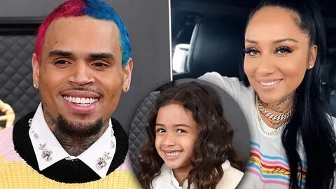 Chris Brown supports Royalty at her football game with baby 