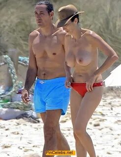 Paz Padilla topless on a beach paparazzi photo