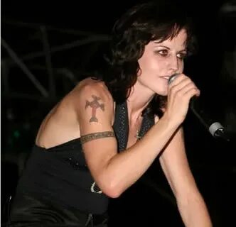 Dolores O’Riordan Tattoos - Celebrities Tattooed
