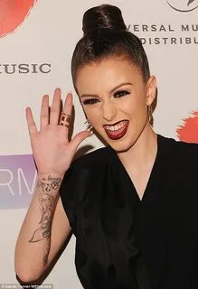 X Factor brat Cher Lloyd can't help put pull funny faces as 
