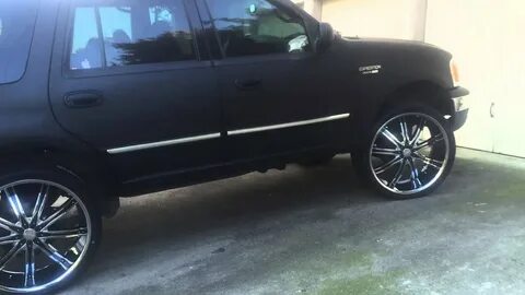 Matte Black Expedition on 26 inch Dcenti rims. New paint and