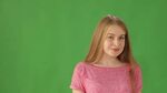 charming girl standing on green background Stok Videosu (%10