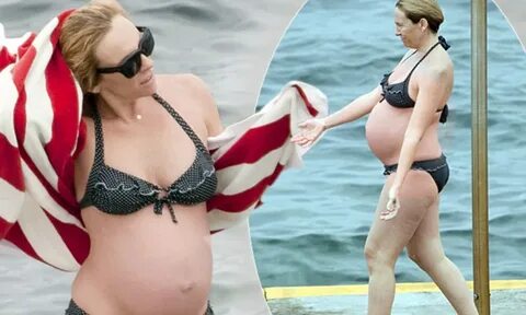 Heavily pregnant Toni Collette cools off in tiny polka dot b