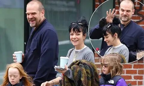 Lily Allen giggles as she heads out with husband David Harbo
