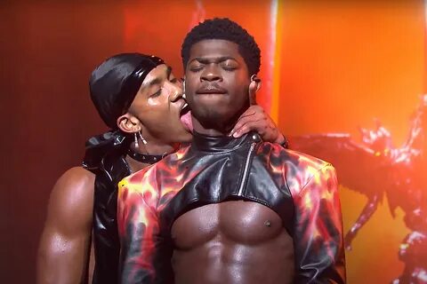 Lil Nas X gets licked during his SNL Performance. 