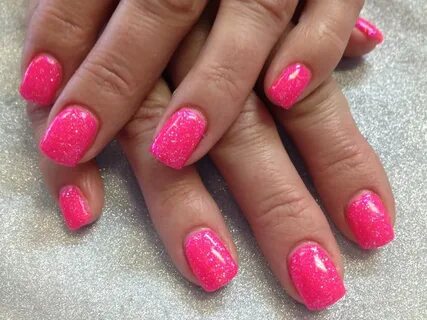 Screaming neon pink gel nails with glitter overlay. How pret