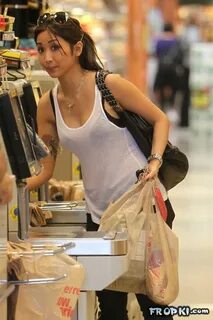 Brenda Song - Brenda Song in bra enhancing Tank Top at Ralph