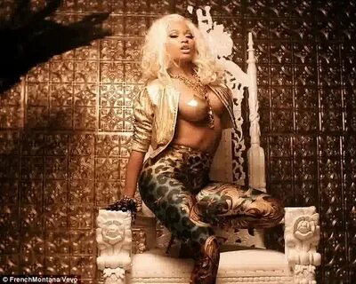 Nicki Minaj draws attention to her best assets in neon banda