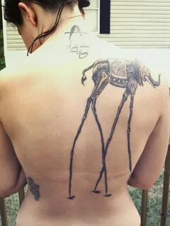 Dali elephant tattoo on back of shoulder - Tattoos Book - 65