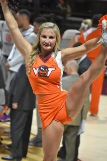 VT CHEERLEADER The Virginia Tech Cheerleaders perform duri. 