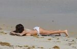 Brooke Burke goes TOPLESS during vacation to St. Barts Daily