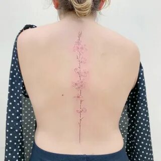 Pin on Flower spine tattoos