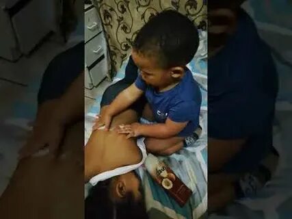 Brother gives his sister a back massage - YouTube