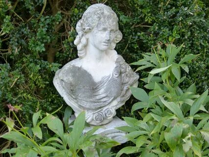 Statue of a woman in the garden free image download