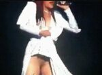 Faith Evans flashes her flesh coloured panties on stage...ma