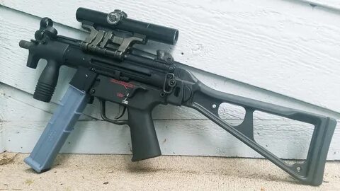 Weird guns that I'm into part 1: Mp5k in 10mm with a Hensold