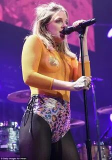 Tove Lo exposes breasts in fishnet top at Jingle Ball in Phi