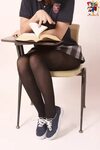 Shelby from Zoligirls posing as a cute schoolgirl in tights 