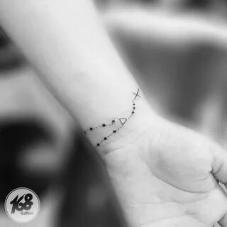 small rosary tattoo on wrist Rosary tattoo wrist, Rosary tat