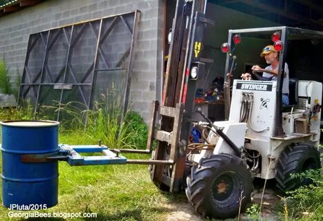 BOBCAT LOADER Honey Loading South Georgia Beekeeping Gallber