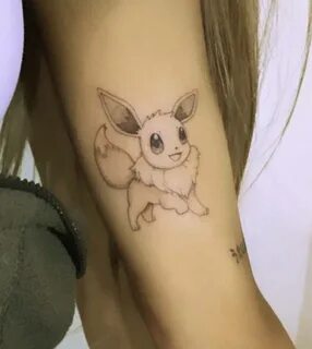 Eevee tattoo on Ariana Grande.