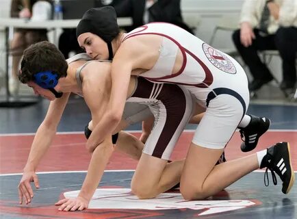 Men Wrestling Women: two equal wrestlers lock up