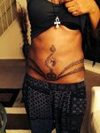 Wrap around waist tattoo #tribal Waist tattoos, Thigh tattoo