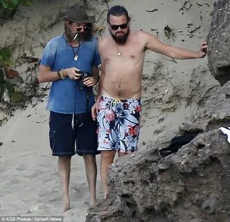 Leonardo DiCaprio ushers bikini-clad beauties aboard his boa