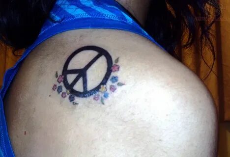 Tiny Flowers And Peace Sign Tattoo On Back Shoulder Tattoo