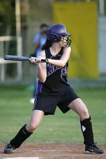 Young striker in softball free image download