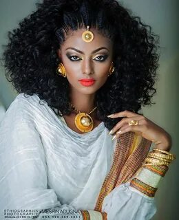 Image may contain: 1 person Ethiopian hair, Natural hair bun