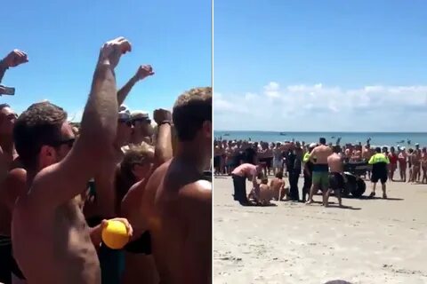 Teens busted for having sex on beach while crowd cheered