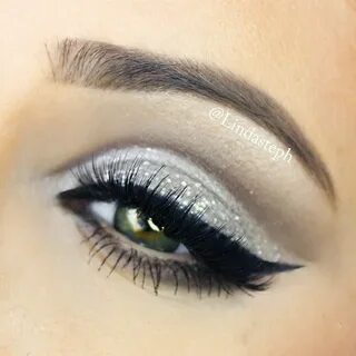 Silver glitter eyes with dramatic winged liner #eyes #eye #m