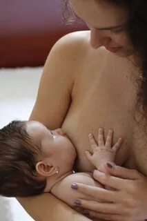 Mother breastfeeding her child free image download